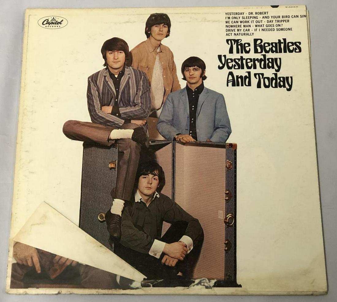 Beatles Yesterday & Today LP Pasteover Butcher Cvr: Beatles Yesterday & Today LP, Capitol Records T-2553, Mono, 1966, second state cover, paste over of the Butcher Cover with the Trunk cover, you can see Ringo's V-neck black shirt under the white area,