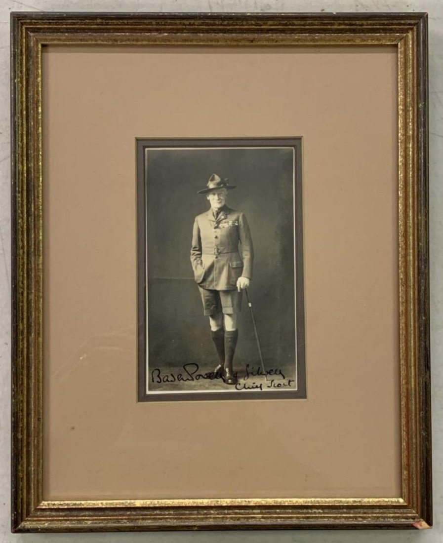 General Robert Baden Powell Signed Photo: Vintage 3-1/4" x 5-1/4" photo or General Robert Baden Powell, standing with one hand in his pocket and the other on his walking stick. Strong signature in fountain pen, "Baden Powell of Gilwell, Chief