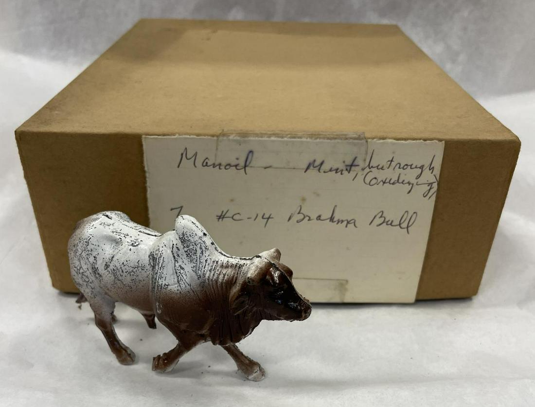 Partial Case Manoil C-14 Brachma Bulls: Includes 7 of 12 mint in box. They include an original factory case and inserts, over-written Cows box. From The Jack and Maurice Manoil Family Collection.