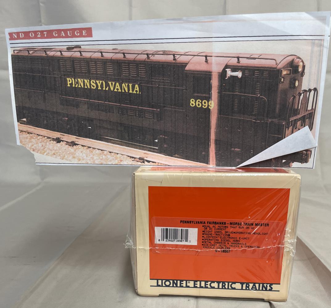 Lionel 18307 PRR FM Diesel: Nice dual motor FM with horn. It appears to be factory shrink wrapped in box.