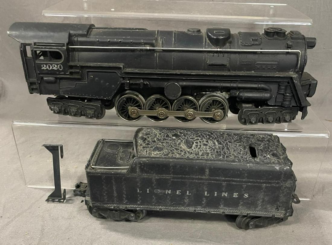 1946 Lionel 2020 Steam Turbine: Includes a 2020 6-8-6 steam loco, 1st version, but smoke bulb unit is missing the bulb cab and bulb, rear step part loose; 2466WX Tender, no whistle. It shows moderate play wear. From The Estate Colle