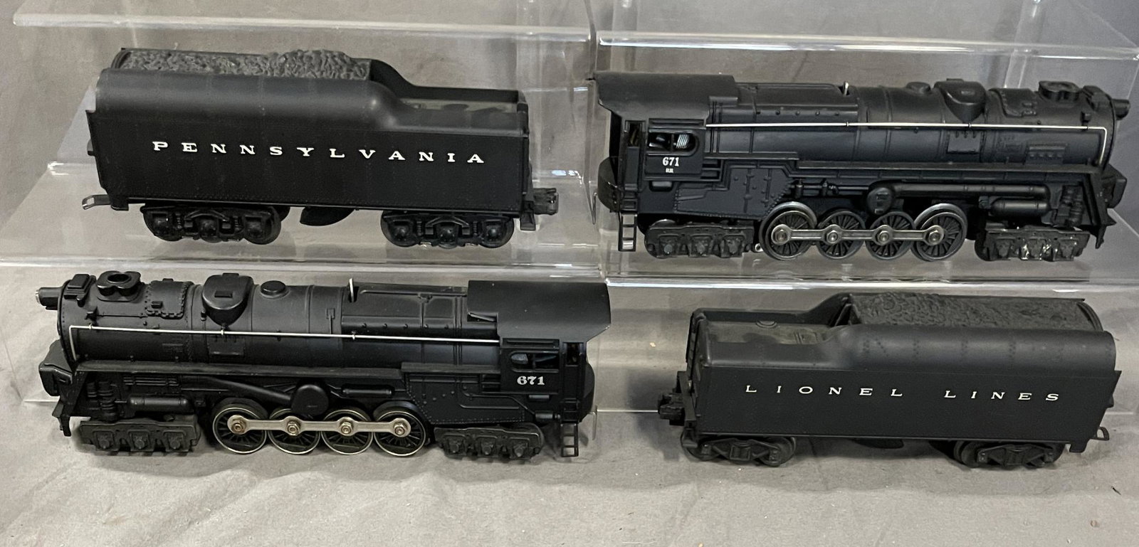 Clean Lionel 671 & 671RR Turbines: Includes a 1949 #671 with 2671W PRR tender with after-market back-up lights, showing very light use; 671RR re-issue from Korean War 1952 with incorrect 2046W tender, both showing light playn wear. Fro