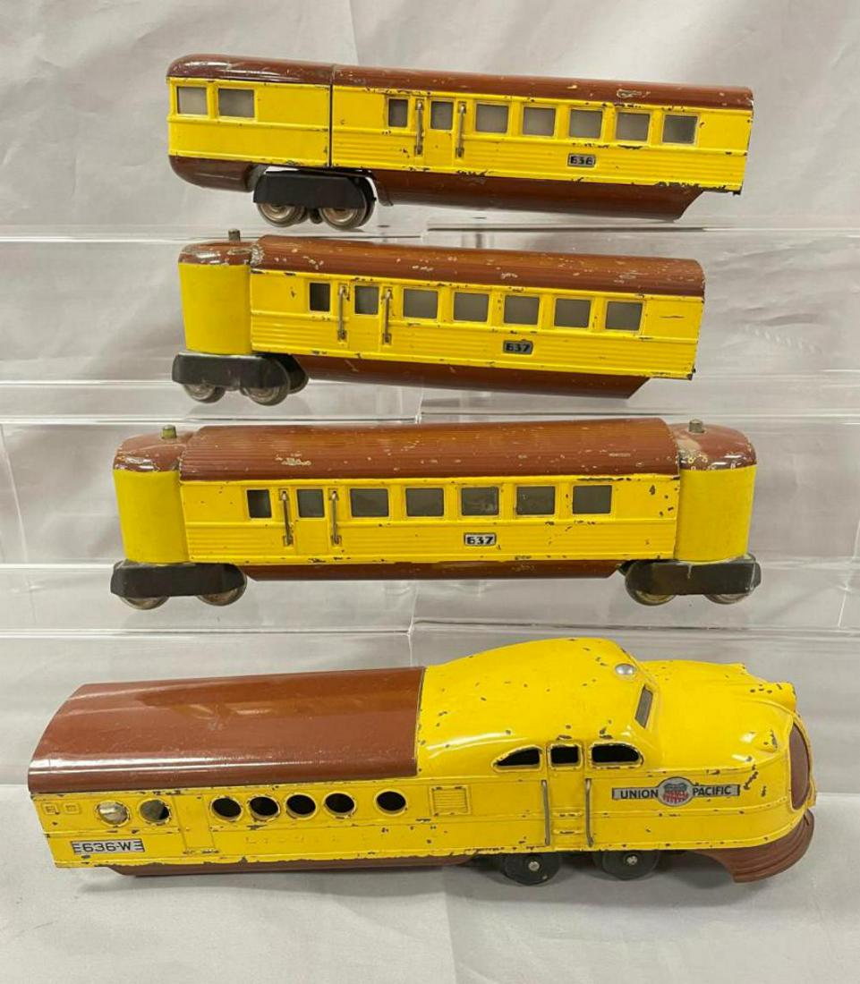 Lionel 636 City Of Denver Streamliner (299W): Includes a 636W Diesel; 2 #637 Coaches; 638 Observation. This is the dark brown variation with two-tone vestibules. It shows moderate play wear.