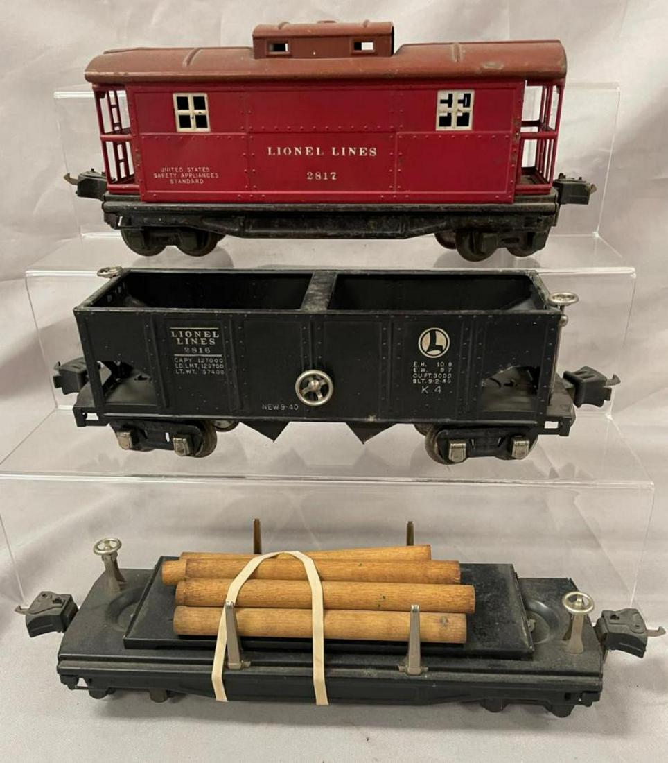 3 Late Lionel Freight Cars: Includes a 2816 Hopper; 2817 Caboose & 3811 Lumber car with logs. They would benefit from a cleaning and show light to moderate playwear.