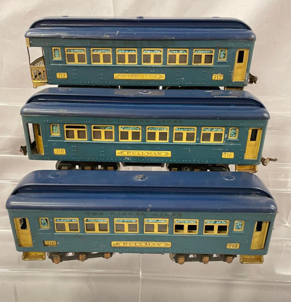 3 Lionel 710 Passenger Cars: 1933/4. Includes 2 #710 Pullmans; 712 Observation. All have nice semi-satin patina with nice lettering and 6-wheel trucks. They show light play wear.