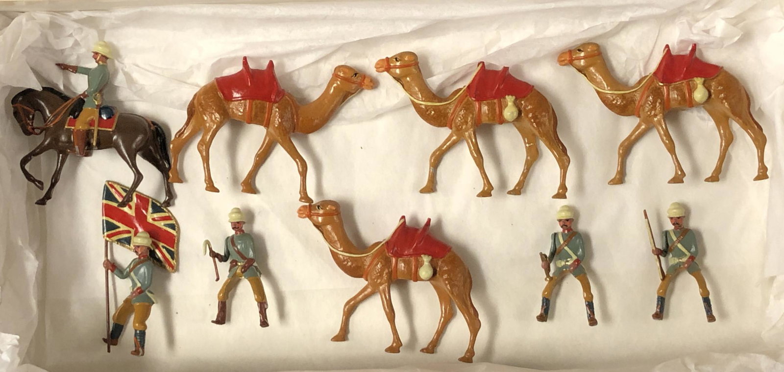 Toy Soldier Camel Corps.: (9) Piece Lot unmarked with Flag Bearer.