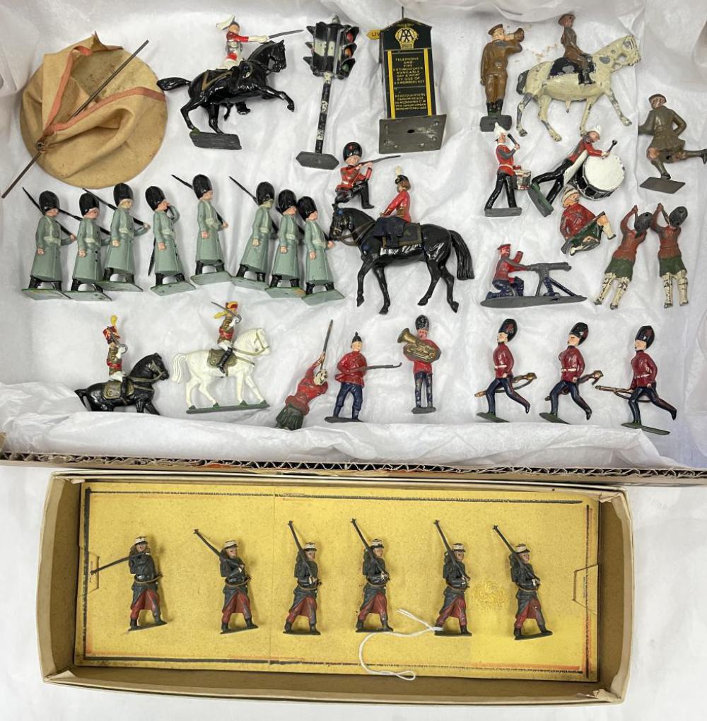 Vintage Soldier Lot, Plus: Includes Britains and John Hill mostly, showing moderate play wear; Britains French Foreign Legion tied on generic card, shows play wear, Dinky tin phone booth; Double Street light & More. From The es