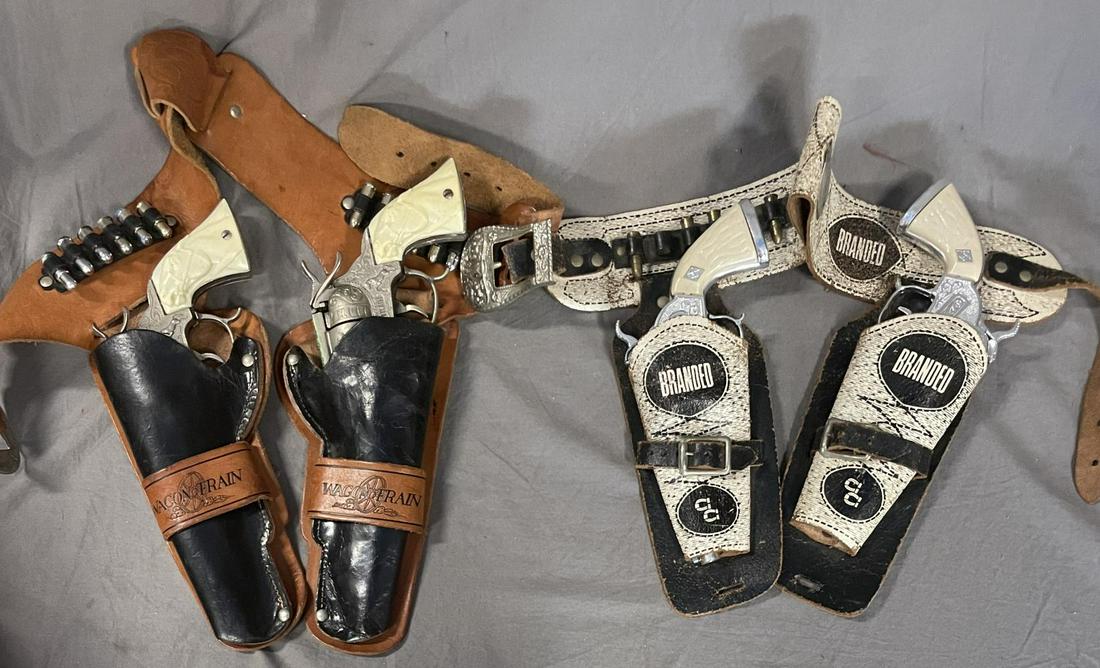 Wagon Train & Branded Double Cap Gun & Holster Set: Includes a Chuck Conners Branded set with 2 Harco die cast cap pistols, both working. Holster is leather with 5/6 brass bullets in sleeve. Holster shows moderate wear, guns like new; Nice Wagon Train 