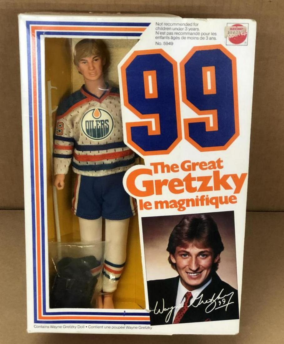 1983 NRFB Wayne Gretzky Doll, Mattel: Never Removed from the Box, "Wayne Gretzky" doll by Mattel, 1983. Box shows light edge and corner wear, a few small tears. Small price sticker affixed at the top right. Cello window is well attached.