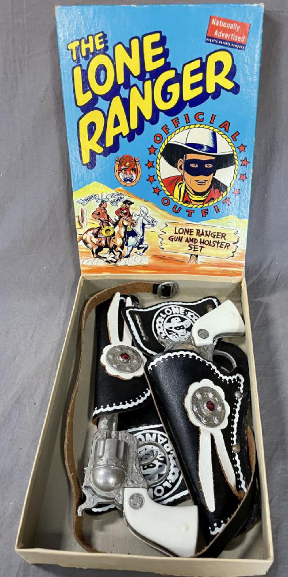 1947 Lone Ranger 2810 Cap Gun & Holster Set: Esquire. Includes a pair of Buckaroo die cast cap pistols, both working with nice leather Holster set with separate belt, plastic mack. Appears like new with nice box.