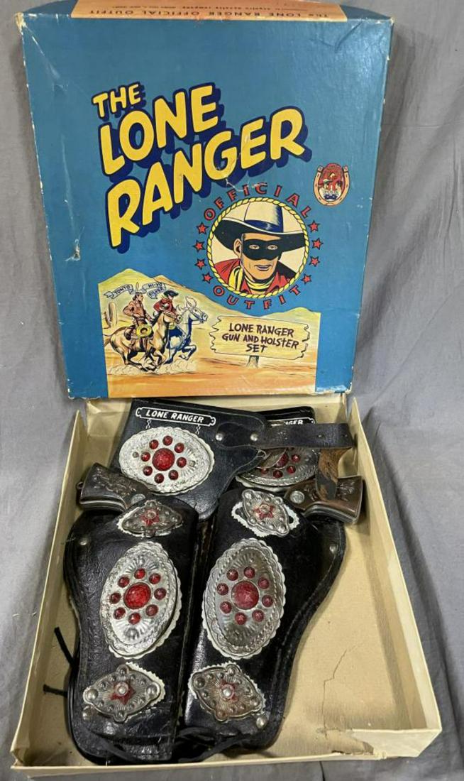 Boxed 1947 Lone Ranger Double Cap Pistol & Holster: Esquire. Includes a pair of LR .32 cap guns, both functional, 1 has cast loop on bottom of grip with leather holster set with 3 plastic bullets in sleeve. One Jewel star on one holster is chipped and