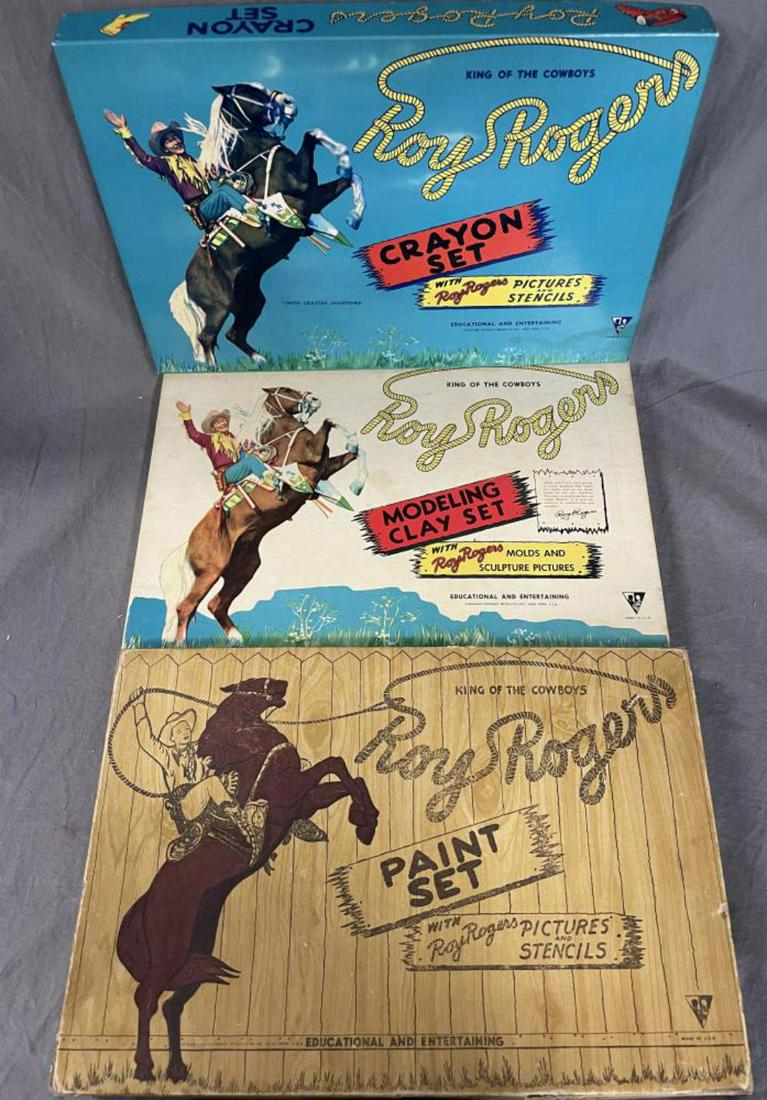 3 Boxed Roy Rogers Art Sets: Includes Toykraft 940 RR Crayon Set, near mint; #923 Modeling Clay Set, NMINT; #939 Paint Set that appears lightly used with several paint containers loose from display base, box shows some wear.