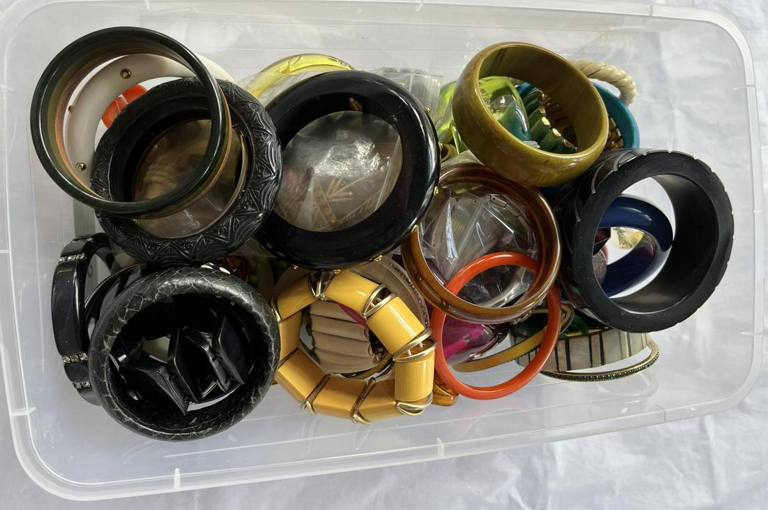 Estate Costume Jewelry Lot.: Tub full includes Bakelite Bracelets, Bangle Bracelets,Acrylic and Enamel Rings etc. See images for details.