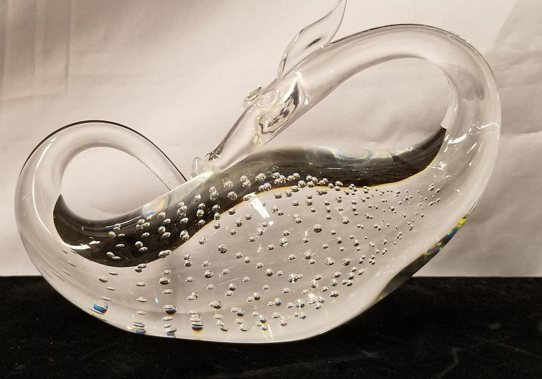 Steuben Signed Crystal Dragon Sculpture: Includes Steuben signed dragon sculpture. Glass has no noticeable flaws. Dragon measures approx. 7.5" long by 5" in height.