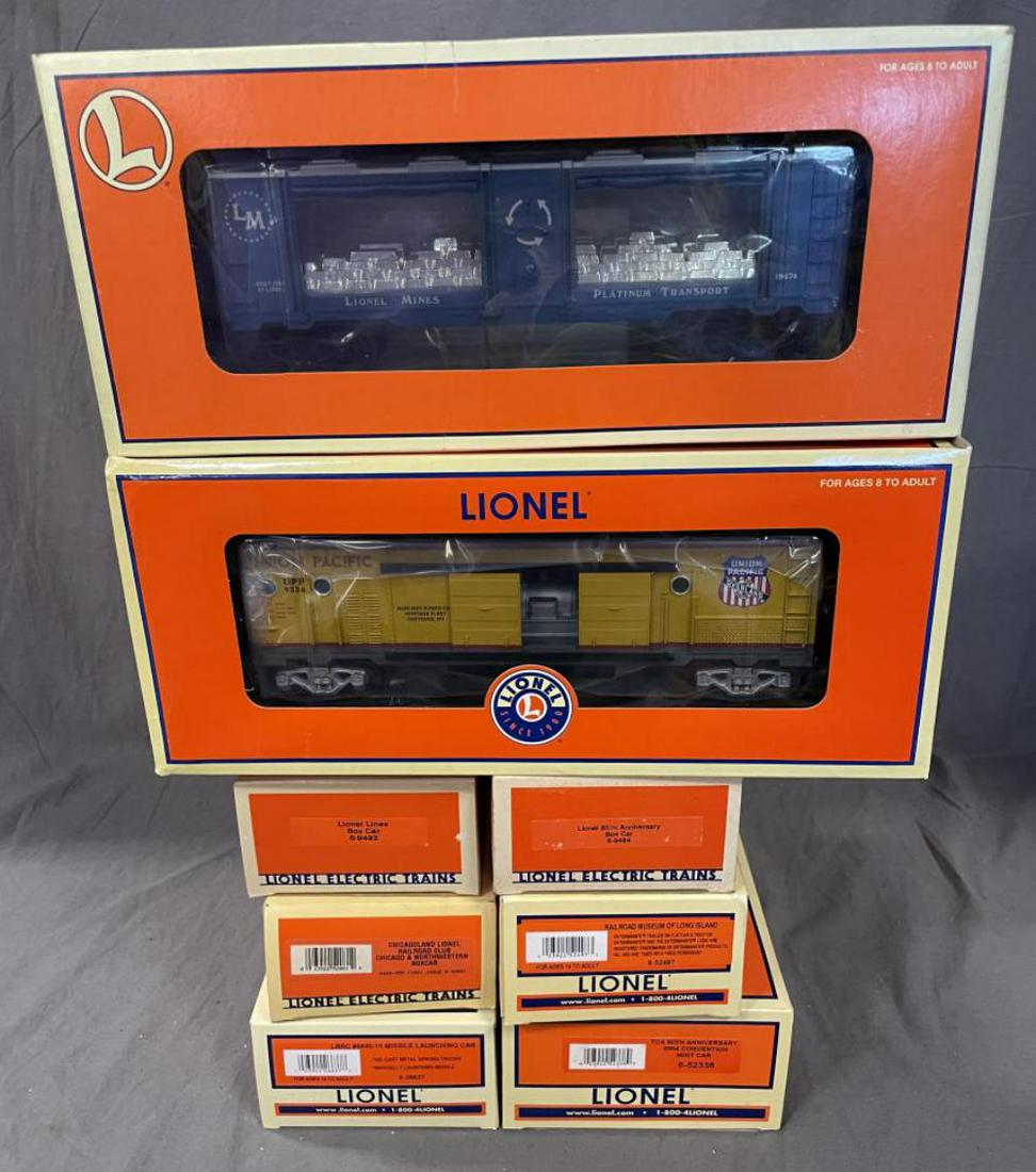 8 Modern Lionel Freight Cars: Includes 19647 Mint; 52412 UP Aux Power car; 52338 Mint; 26637 Missile; 52497 LI Museum; 52081 LRRC BC; 9492 BC; 9484 BC. Some show light use with boxes.