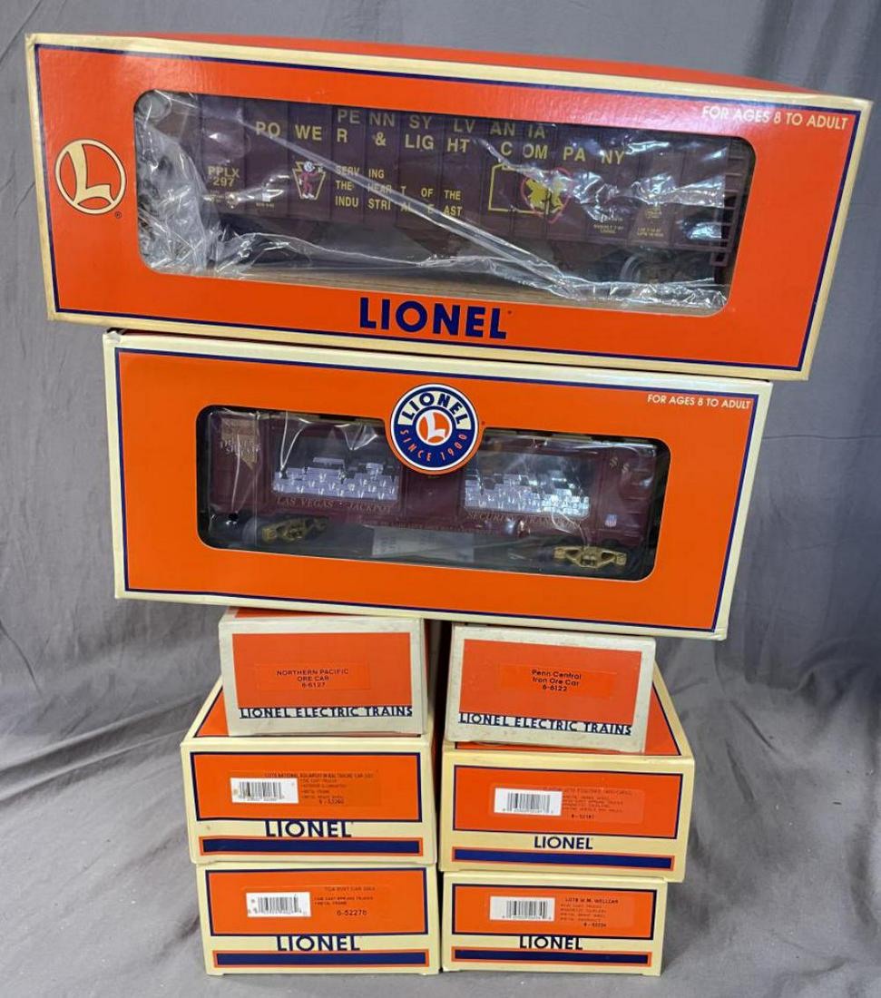 8 Modern Lionel Freight Cars: Includes 52234 Well Car; 52276 Mint; 16813 Hopper; 52260 Aquarium; 52187 Piggy-Back; 52299 Mint; 6122 ore; 6127 ore. A few show light use all with boxes.