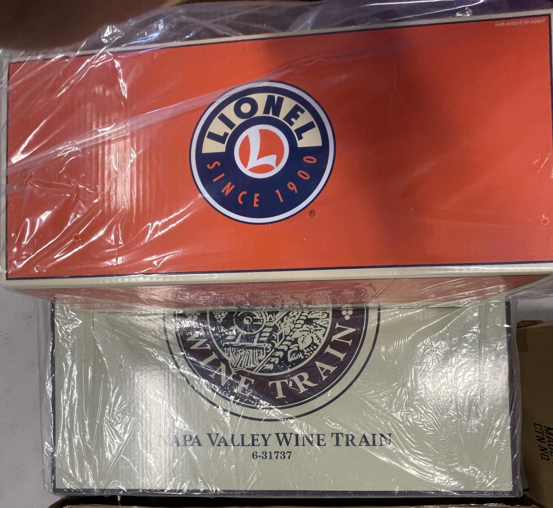 Lionel 31737 Napa Valley Wine Train, Plus: 054. Includes the 31737 set with FPA AA Diesels equipped with TMCC, Odyssey, RailSounds 5.0 CrewTalk, TowerCom and 8 RPM levels, fan driven smoke and more!; 3 heavyweight coaches and observation. All
