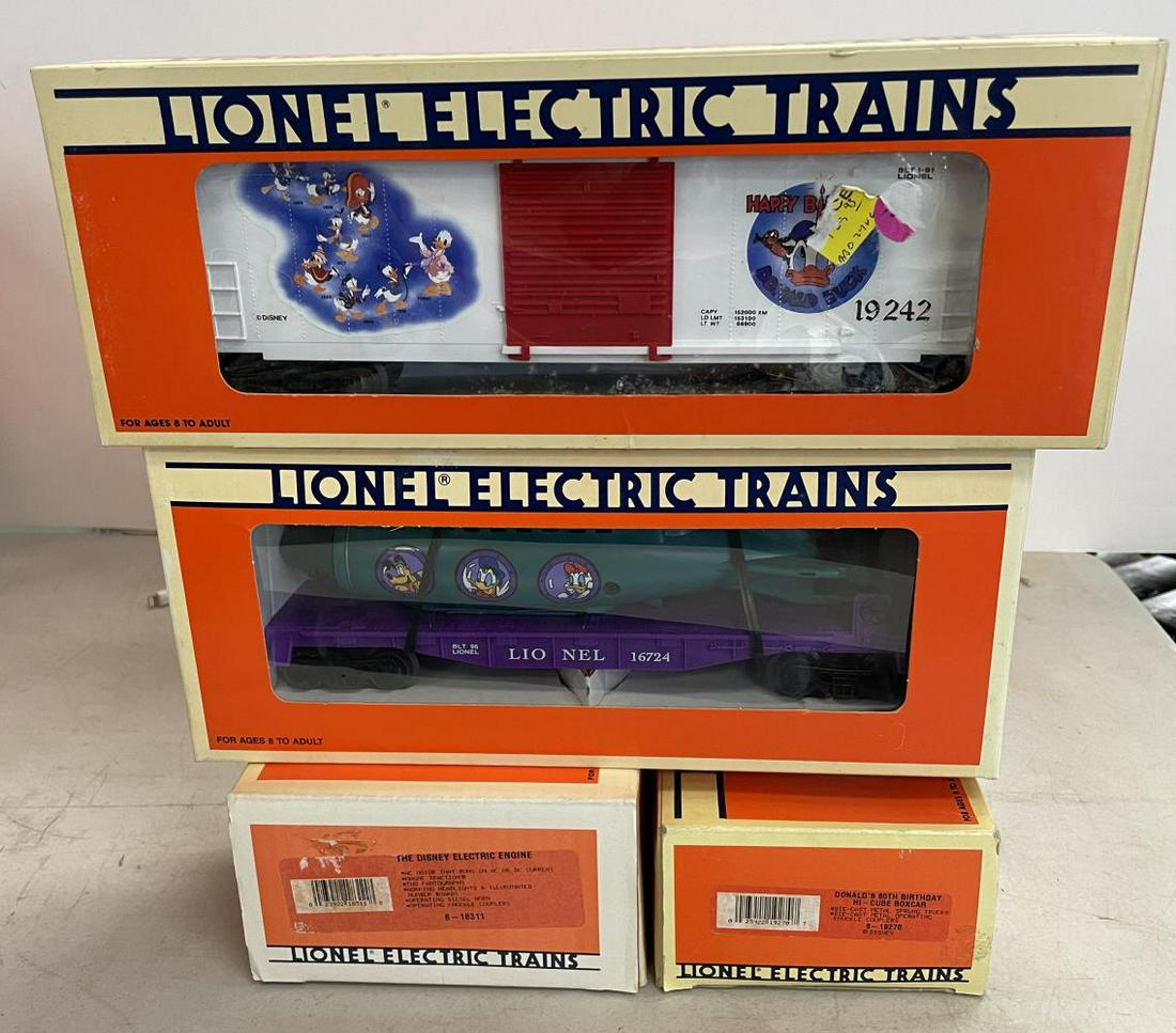 Short Lionel Disney Train: Includes an 18311 Disney EP5 with lights and Horn; 19270 Boxcar; 19242 Boxcar; 16724 Sub Flat. All show light use with boxes.