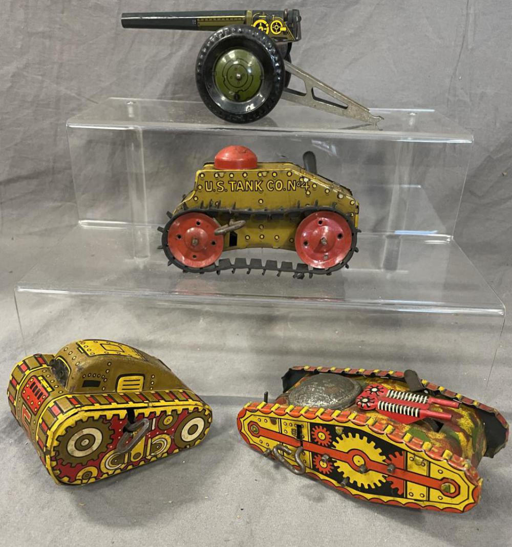 4pc Marx Military Toys Group: Includes a WWI Tank(flat car load) in operating condition; #5 Khaki turn-over tank, not functional; Cannon for Soldiers of Fortune sets, or pulled by a Mack covered truck; #4 Climbing tank with functi