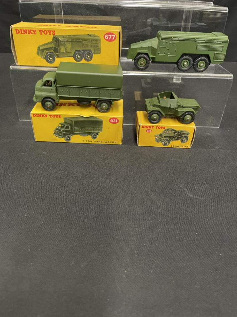 (3) Boxed Dinky Military Vehicles: Includes a 677 Mobile Command Unit; 621 3-Ton Wagon; 673 Scout Car. All vehicles have nice semi-matte patina with better than average boxes.
