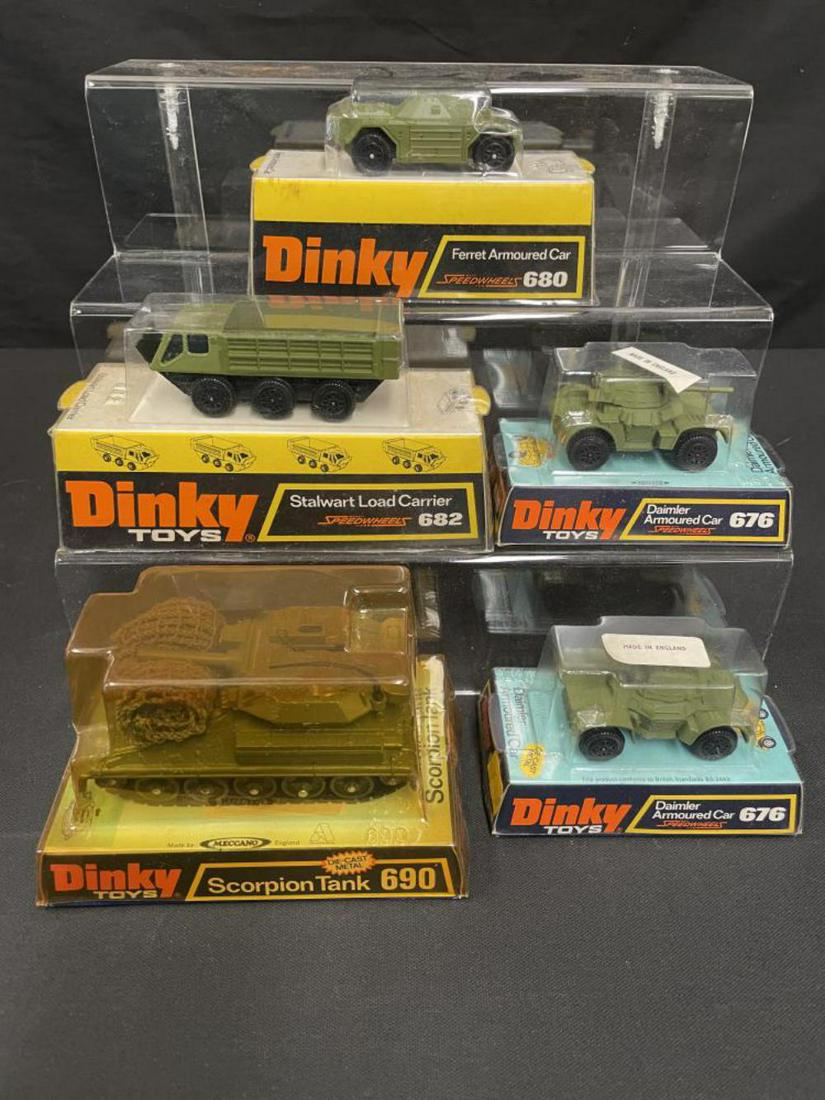 (5) Late Boxed Dinky Military Vehicles: Includes 2 #676 Armored Cars; 680 Scout Car, some corrosion on cockpit top edge; 682 Stalwart; 690 Scorpion Tank, box cover yellowed. Rest appear like new with better than average boxes.
