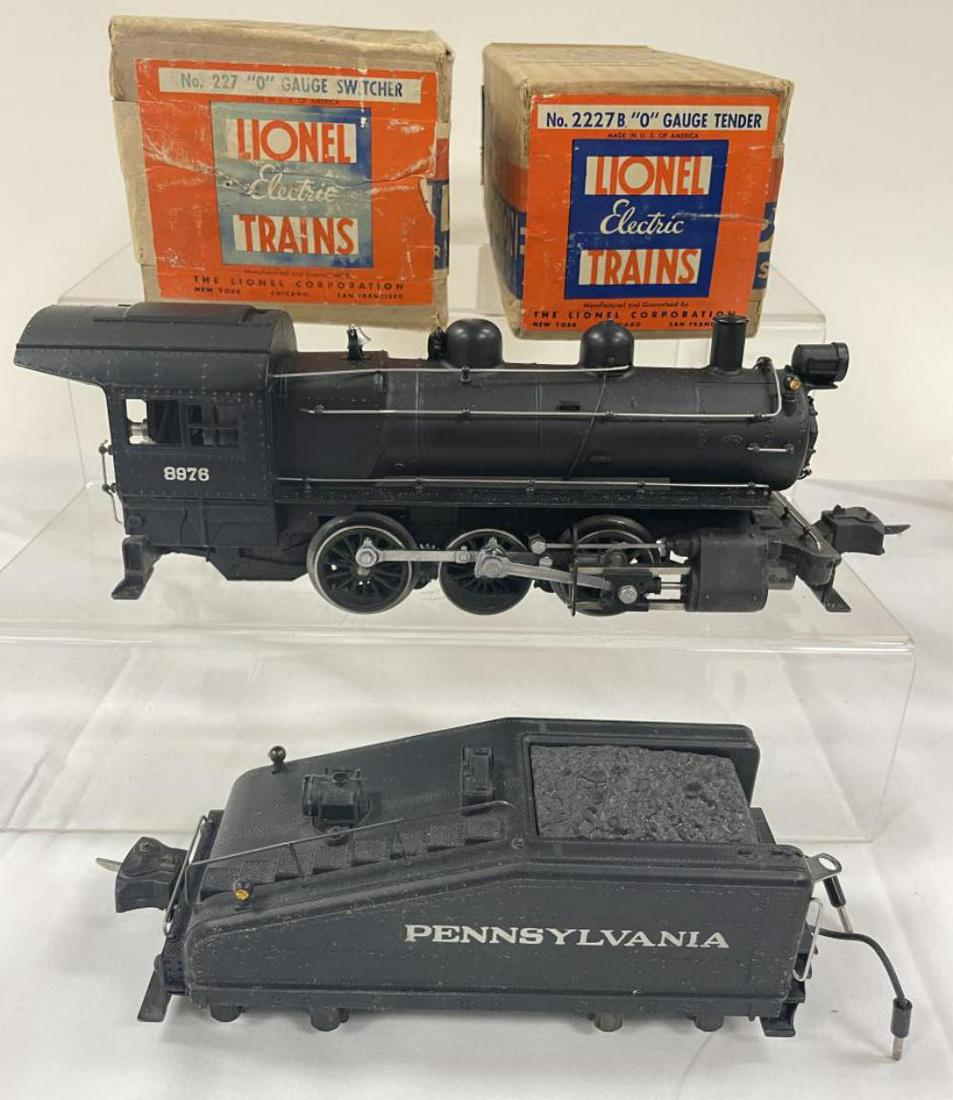 Nice Boxed Lionel 227 Semi-Scale B6 Switcher: Clean with nice semi-matte patina, bright lettering and rods; matching 2227B PRR slant back tender with bell & light. It has 1940 HBC and shows light use with better than average boxes. From The Estat