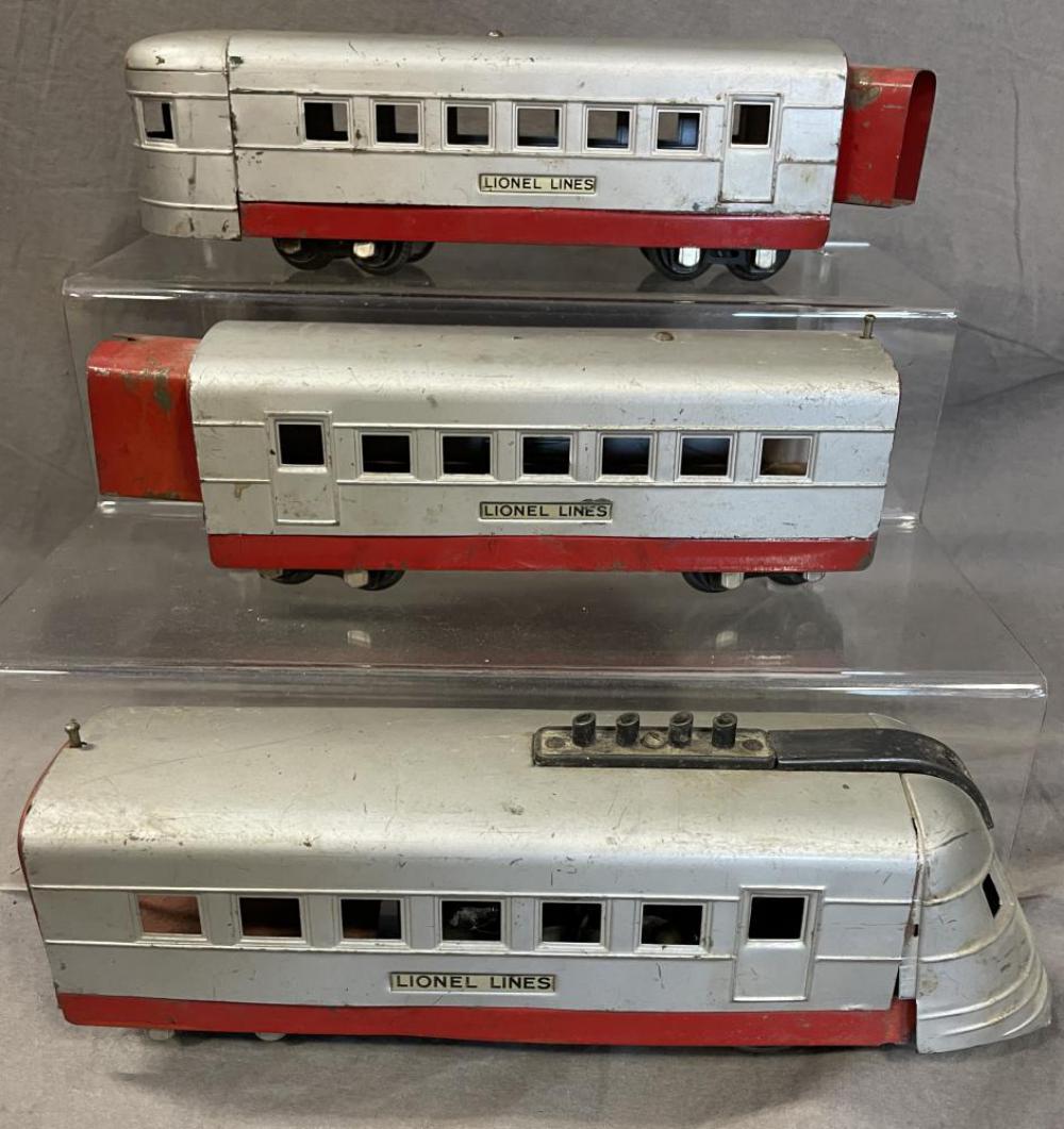 Lionel Jr Uncataloged 1700 Streamliner: Circa 1936. This is the smooth silver painted version with 1700 Diesel; 1701 Coach; 1702 Observation. They would benefit from a cleaning and show light to moderate play wear.