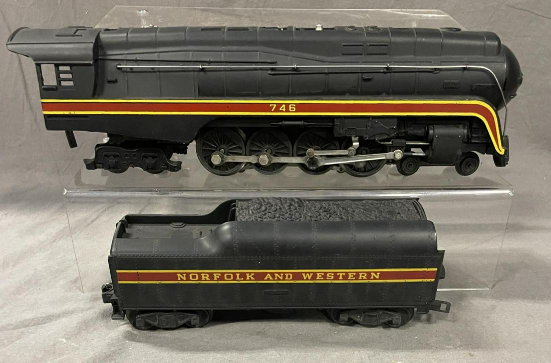 Lionel 746 N&W J, Long Stripe: 1957. Here is a tougher variation 746 streamline Northern. It has the 746WX tender with long stripe. Over-all shows light play wear. From The Estate Collection Of Neil Padron.