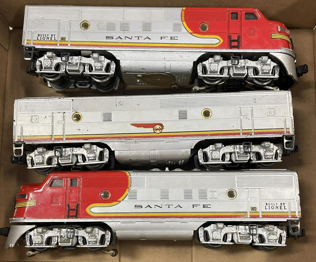 Lionel 2343 SF F3 ABA Diesels: Includes a dual powered unit with clean battery box, front cowl on truck is bent; 2343C B-Unit and 2343T A dummy unit. They are missing some lenses and show moderate play wear.