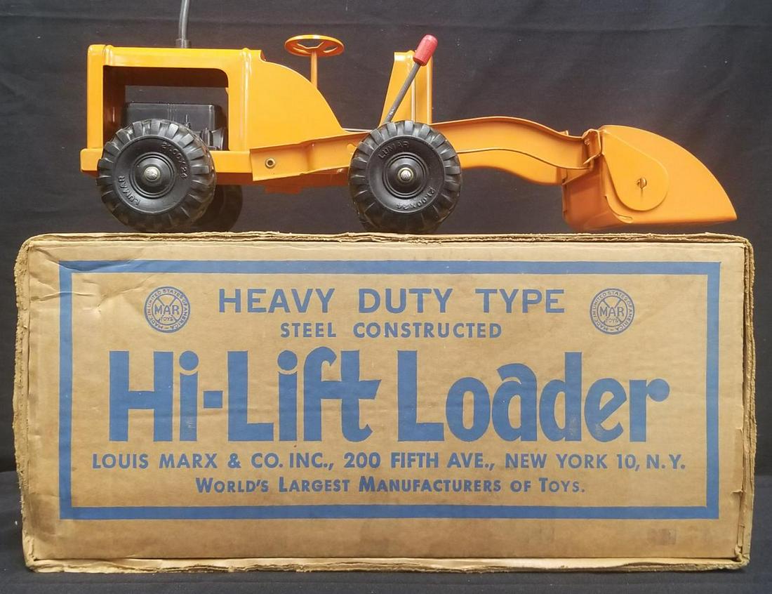 Marx Hi Lift Loader Boxed.: Pressed Steel Orange Loader as new in original box.