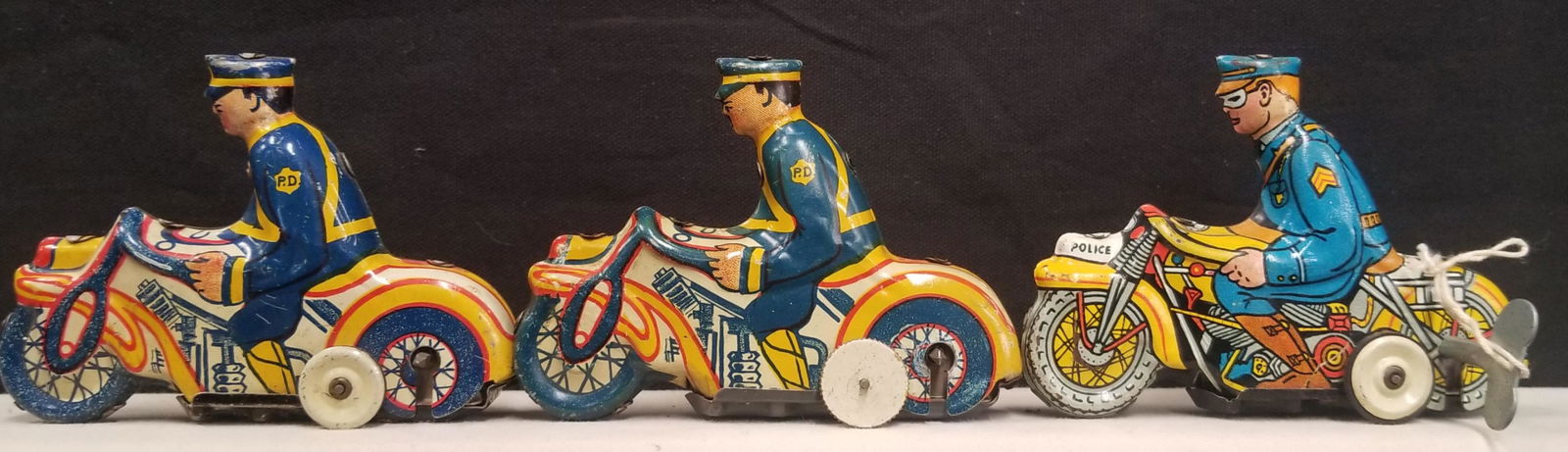Lot of Three Wind Up Police Motorcycles (1 of 3)