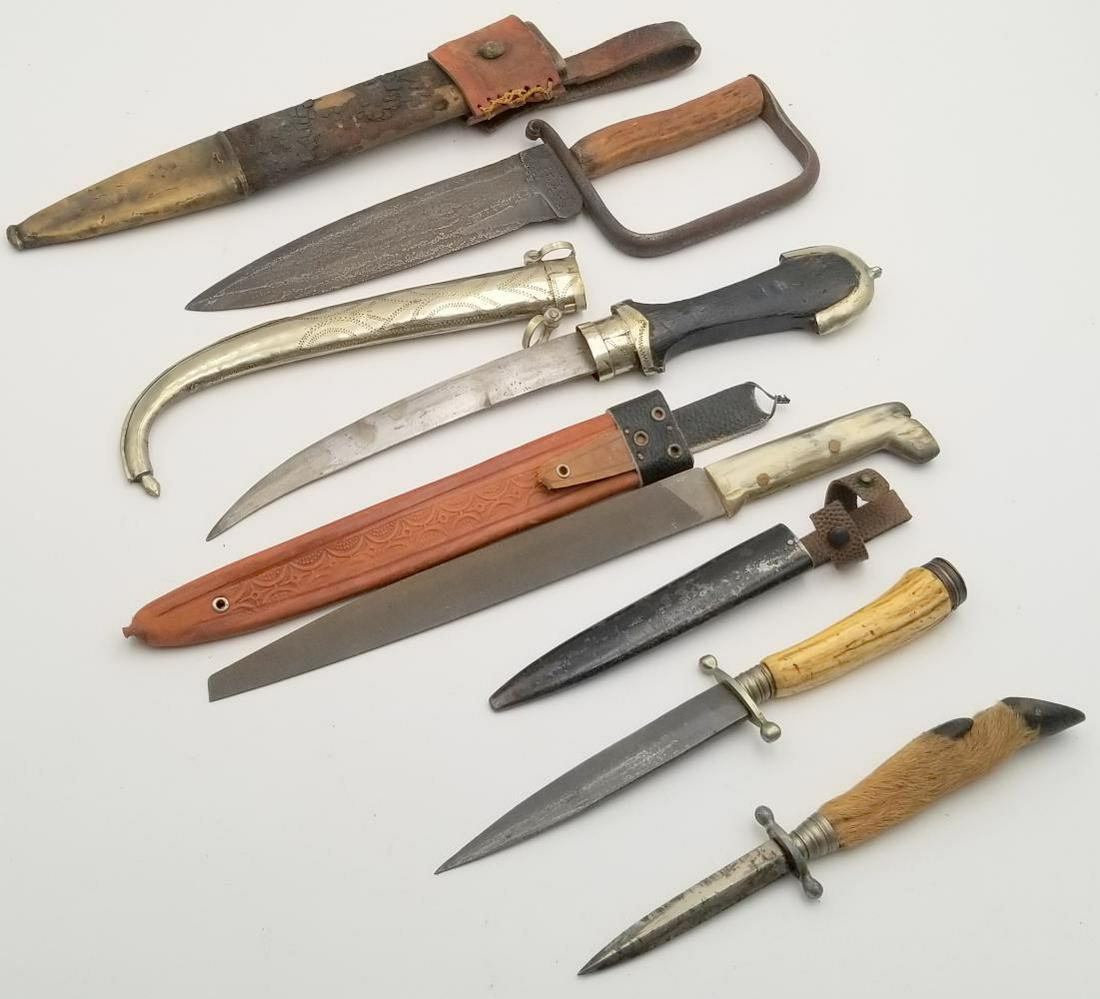 (5) Edged Weapons: Lot of 5 Edged Weapons including (i) knife with scabbard punched "A.T." and "Texas Cav" on blade approximately 17 1/4 inches total length; (ii) deer foot handled dagger marked Anton Wingenje Solingen