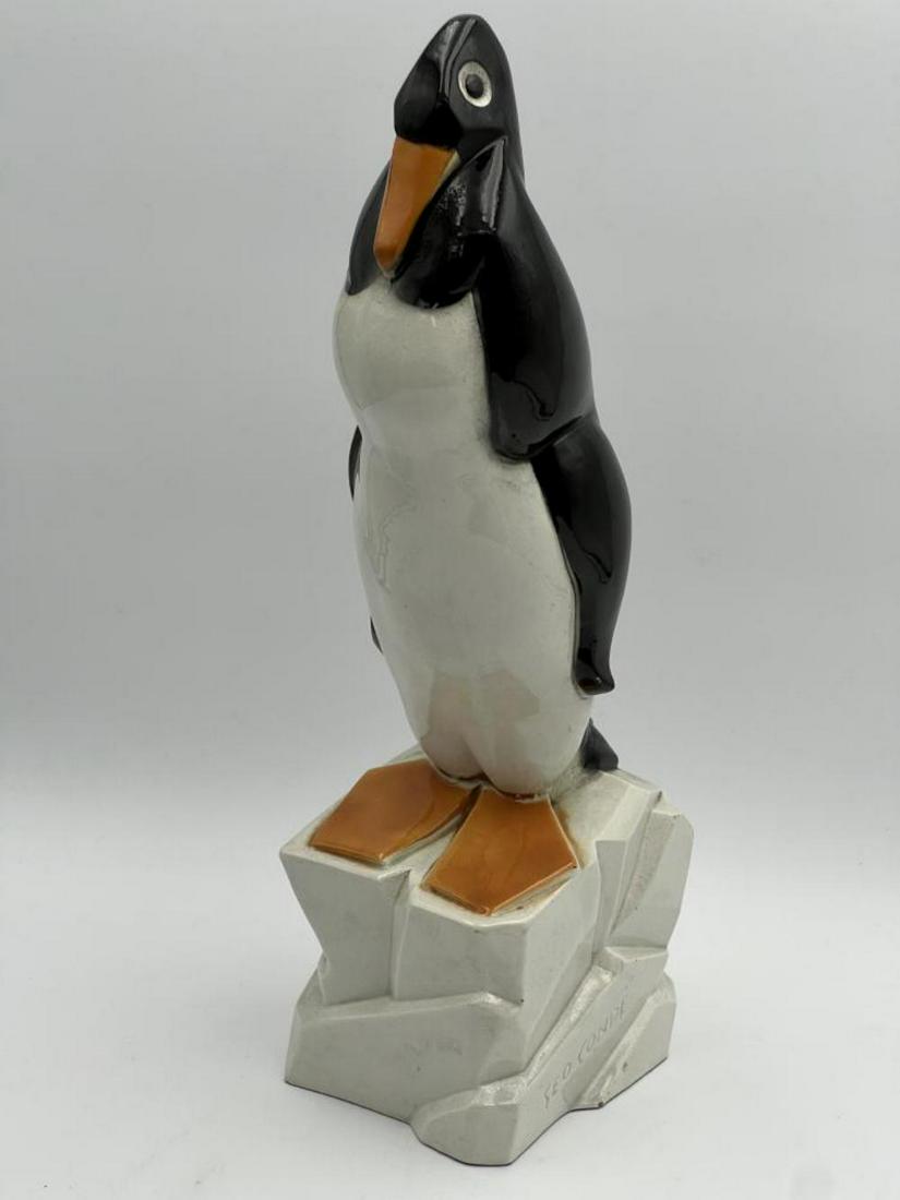 Geo Conde Penguin Ceramic: 18" Tall Ceramic Penguin signed. Previously repaired as there is a crack going around the piece. Also has crazing throughout.
