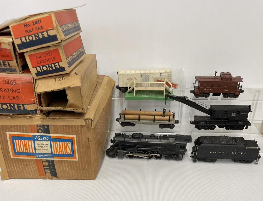 Boxed 1947 Lionel Set 2145WS: Includes a 726 Berkshire Steam loco, very light tweak to cab corner; 2426W cast tender(Repro box); 2411 Log Flat; 2460 Crane with both box inserts; 3462 Operating Milk car, early brass mechanism with