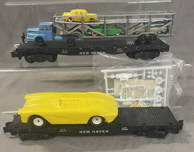 American Flyer 24578 & 24566 Flat Cars: S Gauge. Includes a 24578 Flat with yellow Corvette Kit, parts still sealed in poly bag, flat just missing the brake-wheel; 24566 NH Flat with Auto-Loader. AF Norev Product, just missing 2 vehicles. T