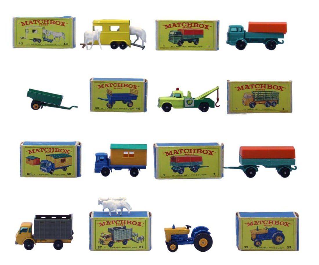 (8) Boxed Matchbox Diecast Cars: 8 boxed Matchbox diecast cars, including 1 Mercedes Truck, 2 Mercedes Trailer, 4 Stake Truck box with a 13 Dodge Wreck Truck inside, 37 Cattle Truck (with cattle, still on sprue), 39 Ford Tractor (whe