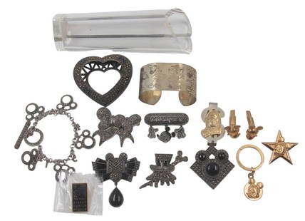 Disney Lot of Judith Jack Sterling Pieces & Gold: Nice lot of Disney Sterling Jewelry pieces by Judith Jack. Includes vase with marcasite base, Mickey Mouse bracelet, (5) different marcasite brooches, sterling cuff with Mickey Mouse images, unmarked