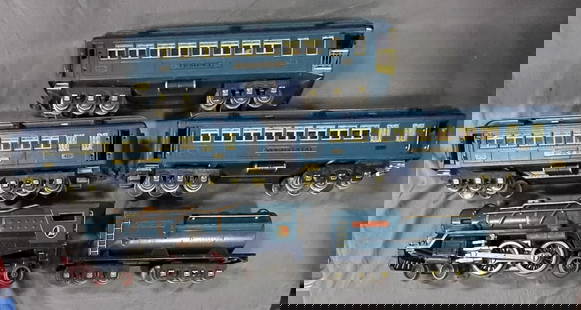 Lionel 400E Blue Comet Set: Standard Gauge. Includes a 400E 4-4-4 steam loco with Chugger. The brake cylinders and steam chests show fatigue, but still together at time of photo. The frame and boiler front are fine as are the wh