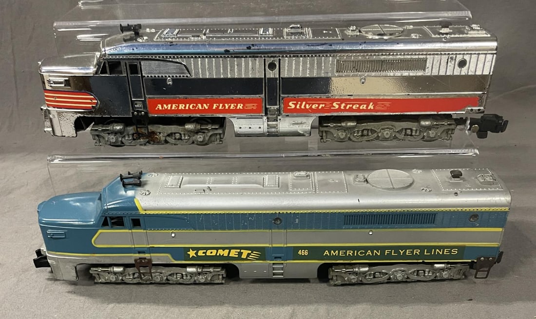 American Flyer 405 & 466 Alco Diesels: S Gauge. Includes a 466 Comet in silver paint, nice decals, showing light play wear; 405 Silver Streak diesel in chrome with 90% stripes intact, only a few small black spots, better than usual.