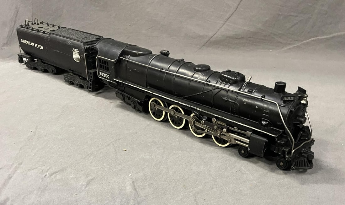 Clean American Flyer 332DC UP Northern: S Gauge. 1950. Fairly clean with bright lettering. White stripe is 85%. It is equipped with light, smoke, CHOO-CHOO and shows light to moderate play wear.