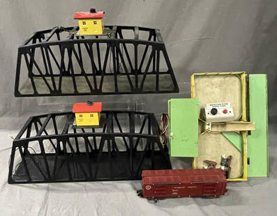 3 American Flyer Accessories: S Gauge. Includes 2 nice 750 Trestle Bridges; 771K Operating Cattle Set with cows, button and 976 Car. All show light play wear.