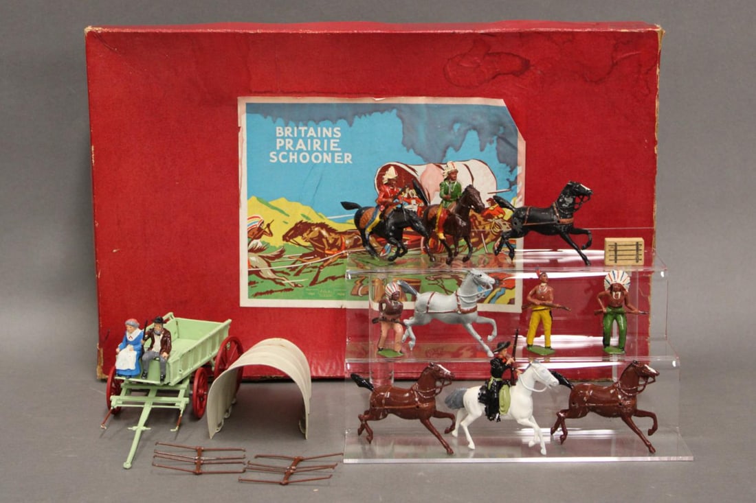 Boxed Britains #2042 Covered Wagon With Escort: Boxed Britains #2042 Covered Waggon with Escort and Attacking Indians Some wear and tape repairs to boxes; minor paint loss.
