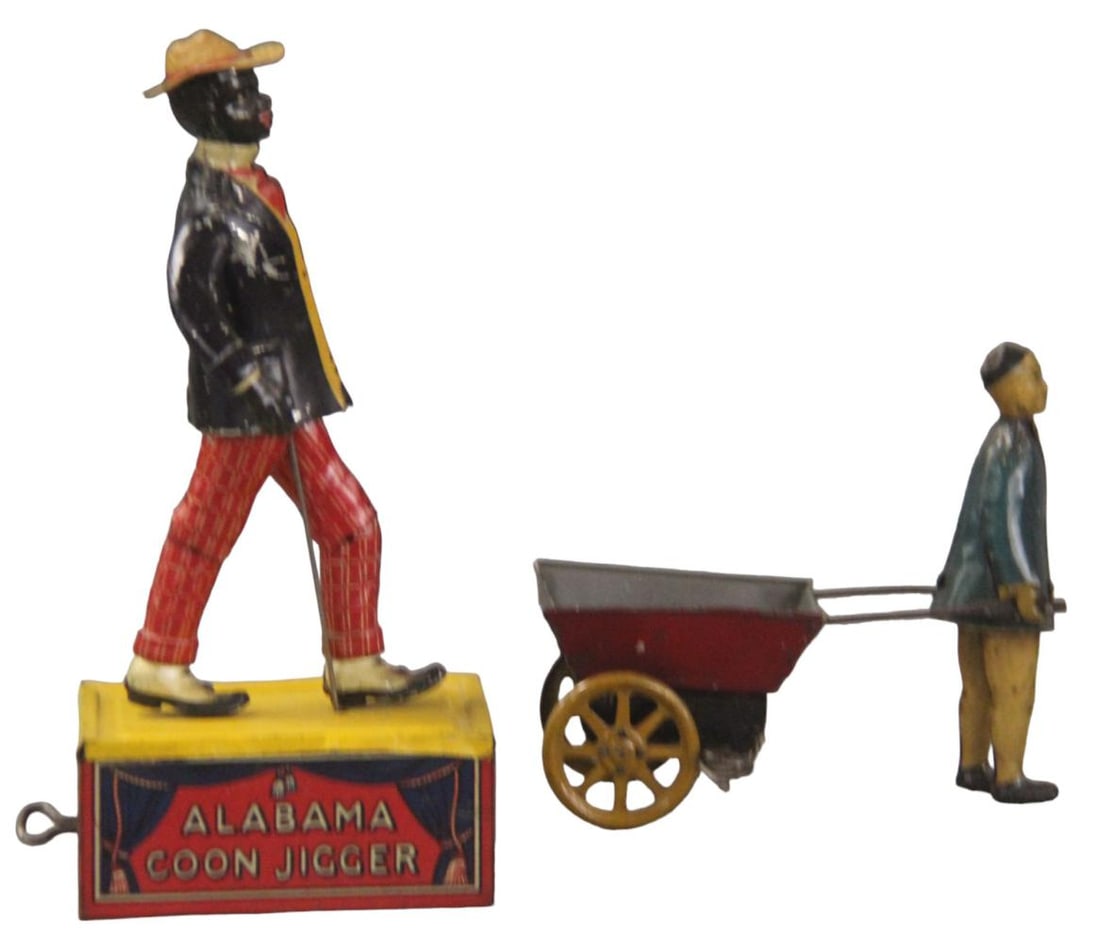 (2) Tin Litho Mechanical Toys: Includes Ferdinand Strauss Tombo Alabama Coon Jigger, and Carter's Toys Man with Cart. Windup mechanisms on each are not working. Both show overall playwear with scuffs, scratches, etc.