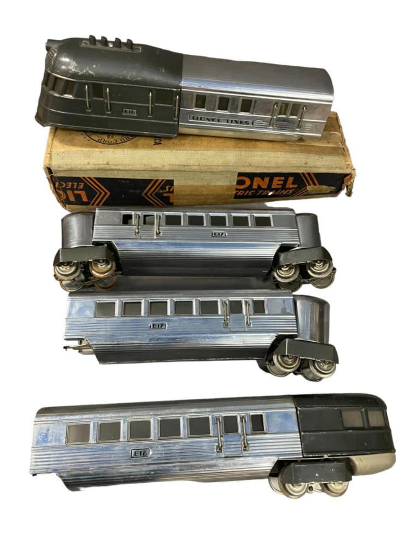 Clean Lionel 616W Flying Yankee: Includes a 616W Diesel; 2- 617 Coaches; 618 Observation. All are clean & shiny, observ. has minor oxidation spots on roof, otherwise shows light to moderate play wear.