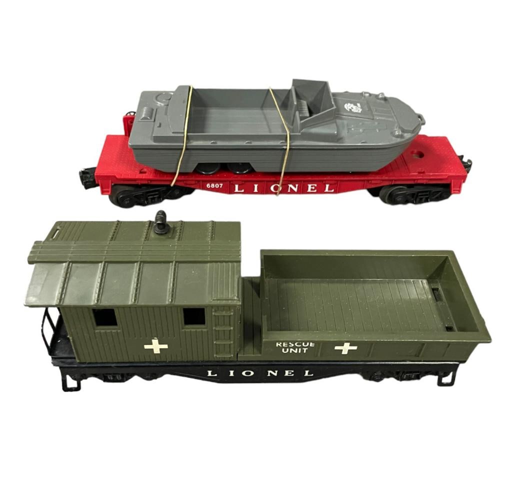 UNRUN Lionel 6807 & 6814-100: Includes a 6807 Flat with USMC DKW; 6814-100 USMC JC Penney Caboose. Both are UNRUN, NMINT. WOW!
