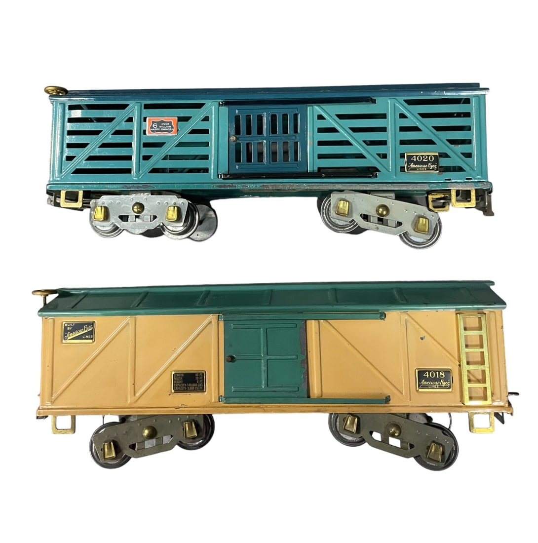 Clean American Flyer 4018 & 4020 Freights: Standard Gauge. Includes a 4018 Boxcar & 4020 Stock car with some flaking on bottom edges. Otherwise they are clean and shiny, showing light play wear.