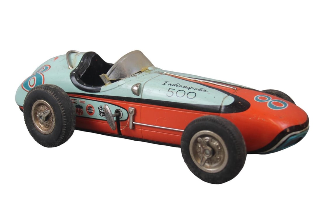 Cragstan Series 4247 Indianapolis 500 Racer: Litho tin friction with automatic jack, 15 inches long. It shows moderate play wear, windscreen glued.