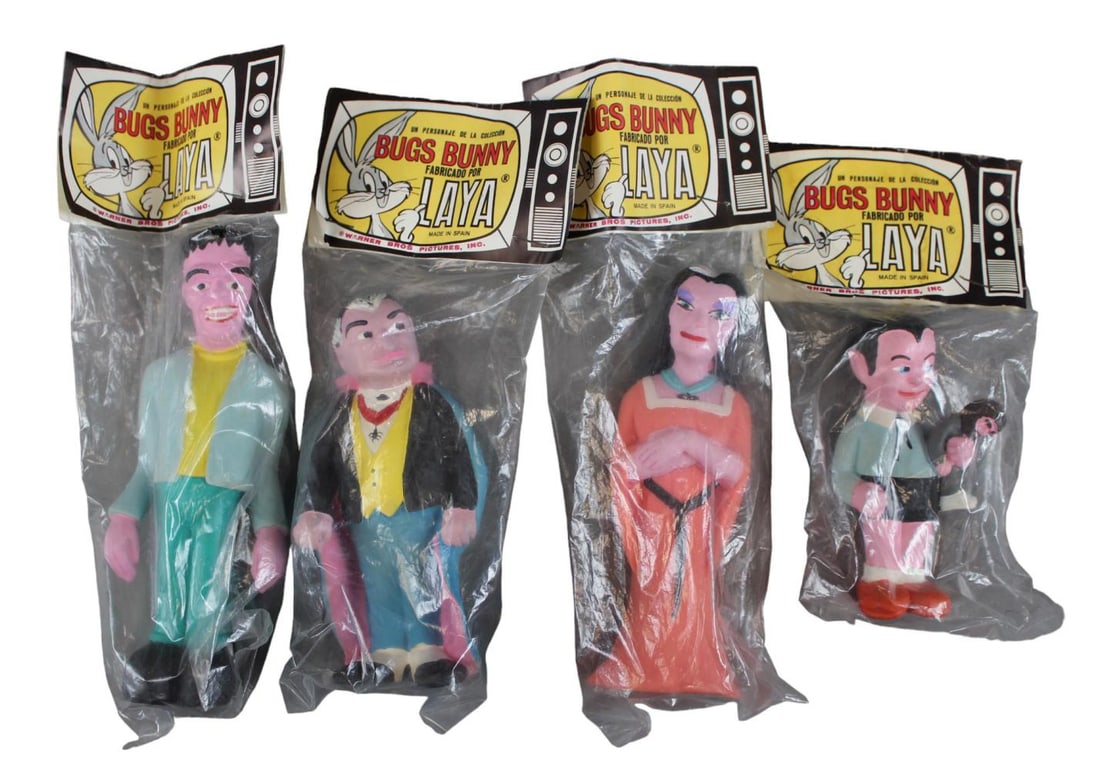 Rare, Munsters Latex Spanish Squeak Figure Set: Made in Spain, Warner Brothers Pictures. Munsters latex rubber squeak toys, all in original unopened packaging. Includes Grandpa, Lily, Herman, and Eddie. Measures approx. 4" - 7" tall.