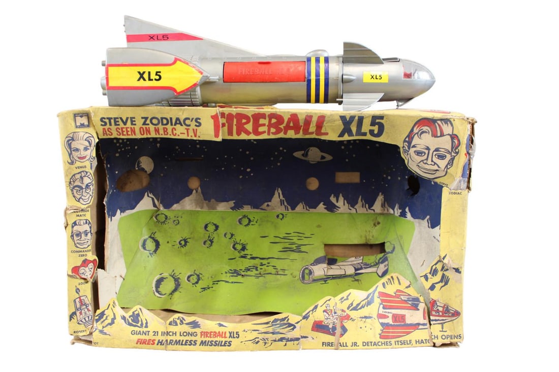 Fireball XL5 Playset in Open Front Box: Old Attic Find that still has Rocket Ship and Capsule, Figures, Decals etc. Box is well worn and missing the front Cello Panel to cover the opening. Well loved but very cool toy. See images to determi