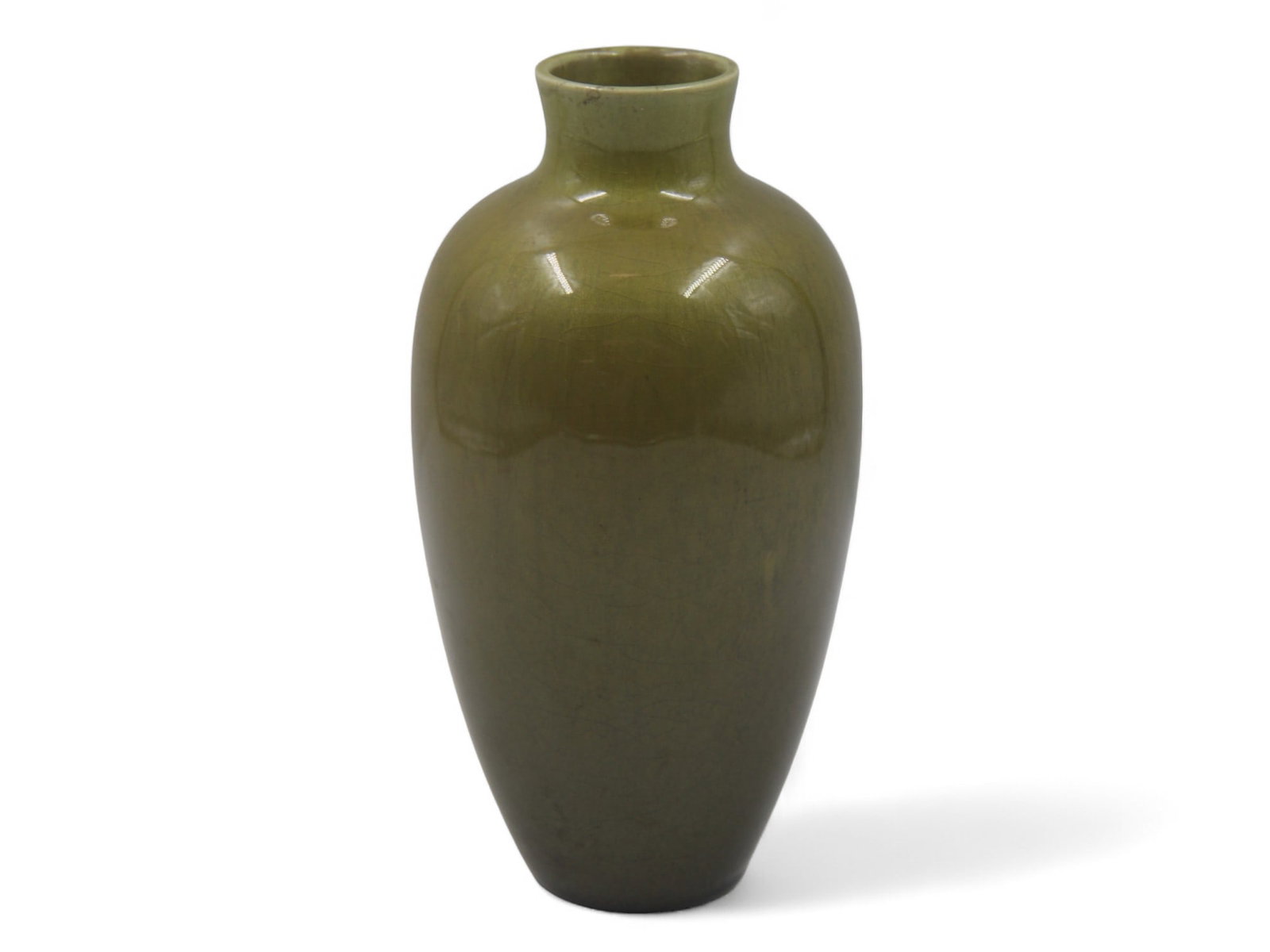 Kenton Hills Green Tiger Eye Vase: Circa 1940's. Green/Olive vase, approx. 8-1/2" tall. Original paper label affixed. Areas of crazing throughout entire piece. This item is Fresh to the Market and comes from a granddaughter of Ernest S